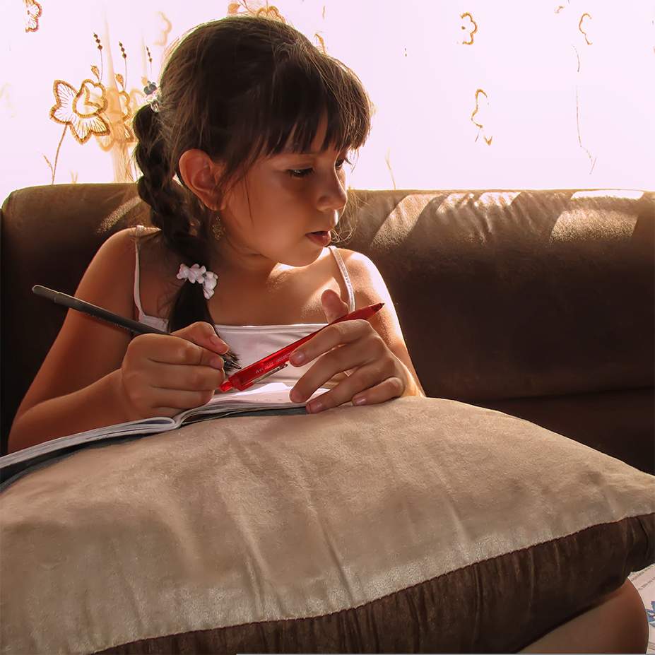 young girl studying
